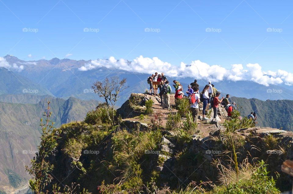 "Welcome to Machu Picchu, elevation 3,062 m" sign and perfect nature photo-opts after hiking at Machu Picchu mountain in Peru.