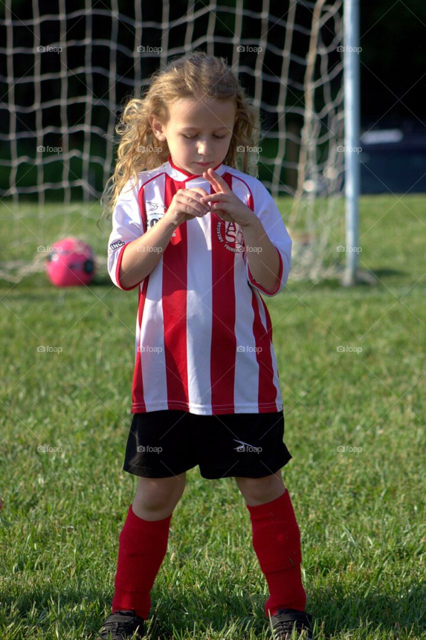Little girl in sportswear