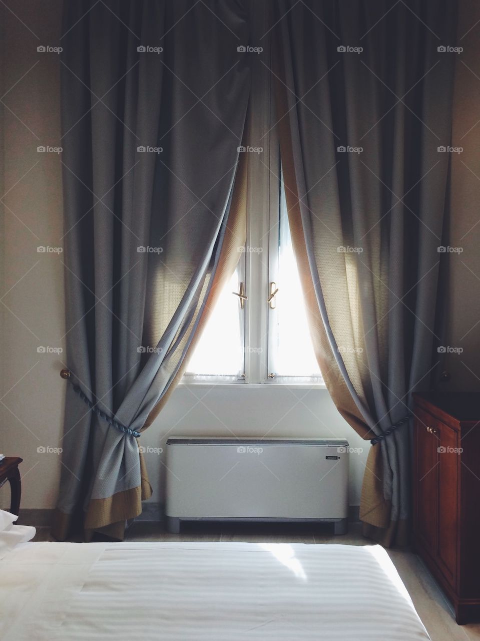 Decorated window in a hotel; Rome, Italy. 