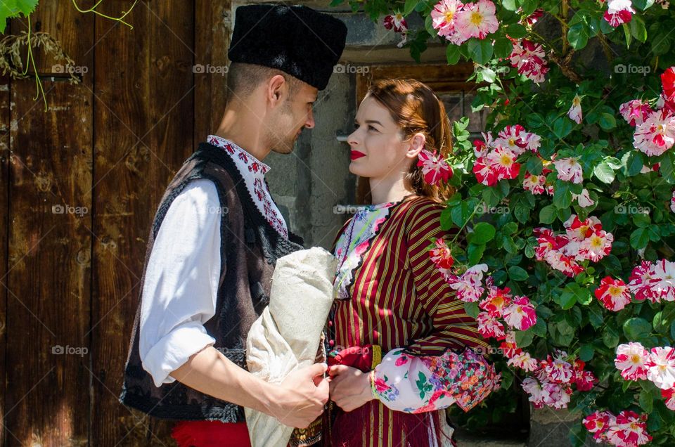 Bulgaria, Kind people dressed in Bulgarian traditional clothing (nosiya)