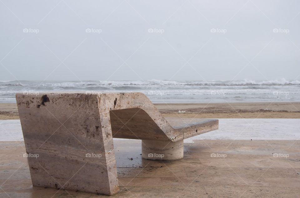 Marble deck-chair front of the sea