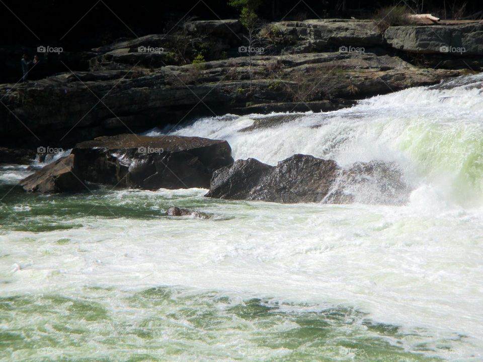 waterfall hitting the rocks