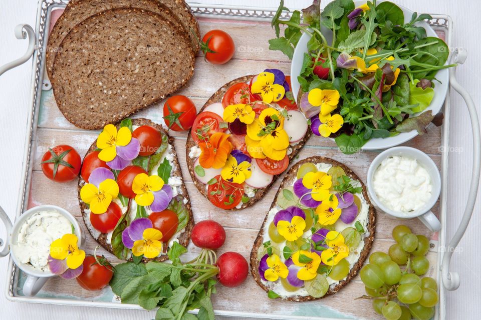 Light and Healthy sandwiches with edible flowers 