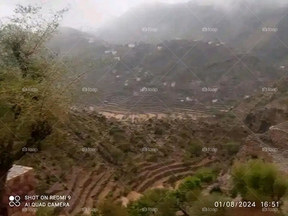 Glory be to God, the magnificent and picturesque view and the natural green trees are a view that is nothing more wonderful than it