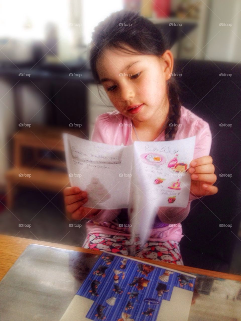 Making a book by herself