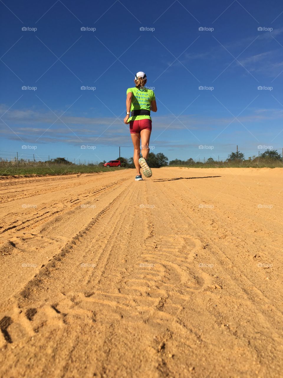 Runner on clay road