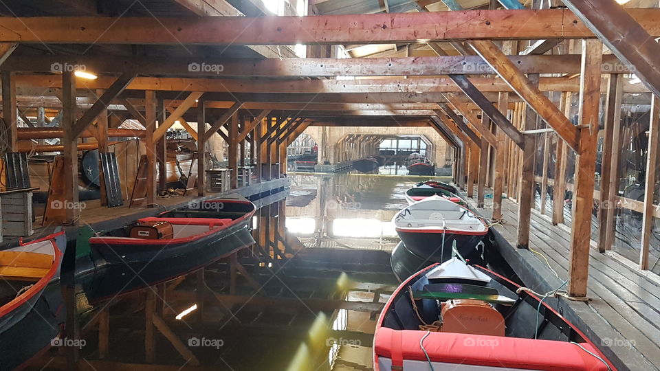 Boats parked in the Broeker Veiling museum and floating auction site at Broek op Langedijk, Netherlands.