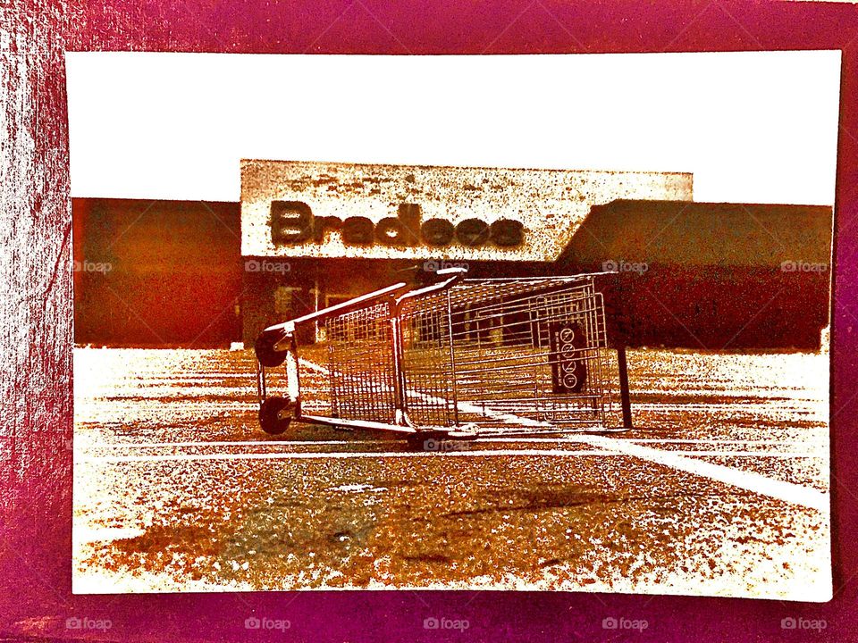 A photograph of a turned over shopping cart outside of “Bradlees” department store in “Cape Code”, Mass by my partner “Timothy Trespas” is further elevated up the ladder of art & design by applying colorized postproduction. 1980. Hypnotic Productions