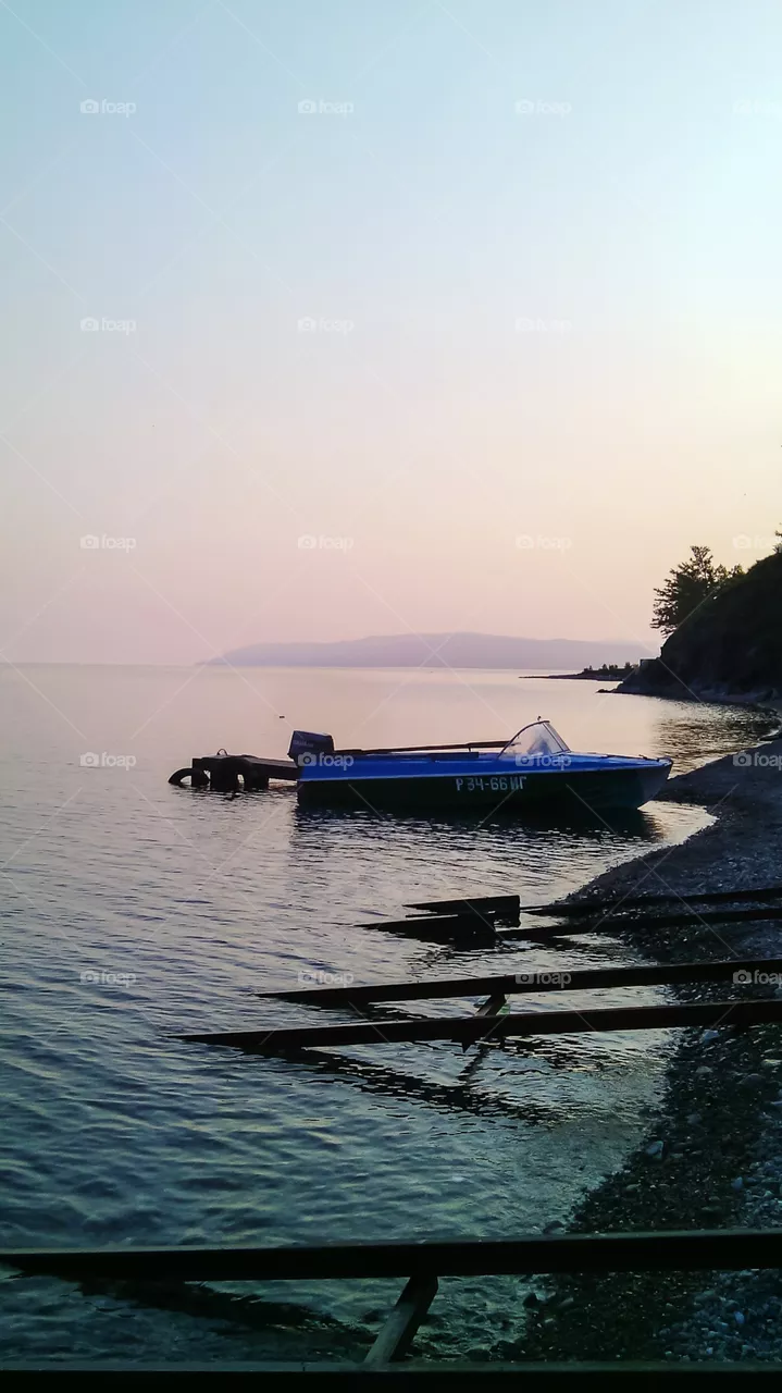Boat by the shore.