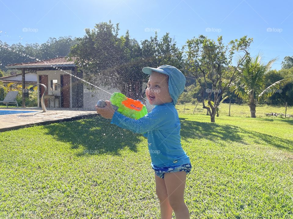 What makes a child happy?  have fun with water