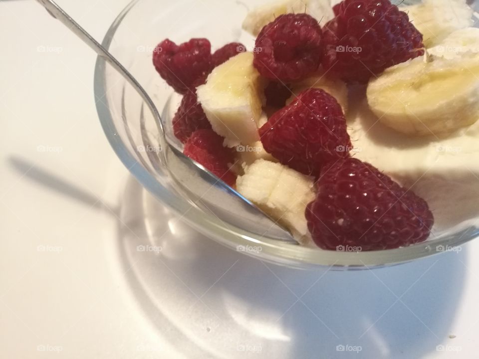 Ice cream with banana and raspberry