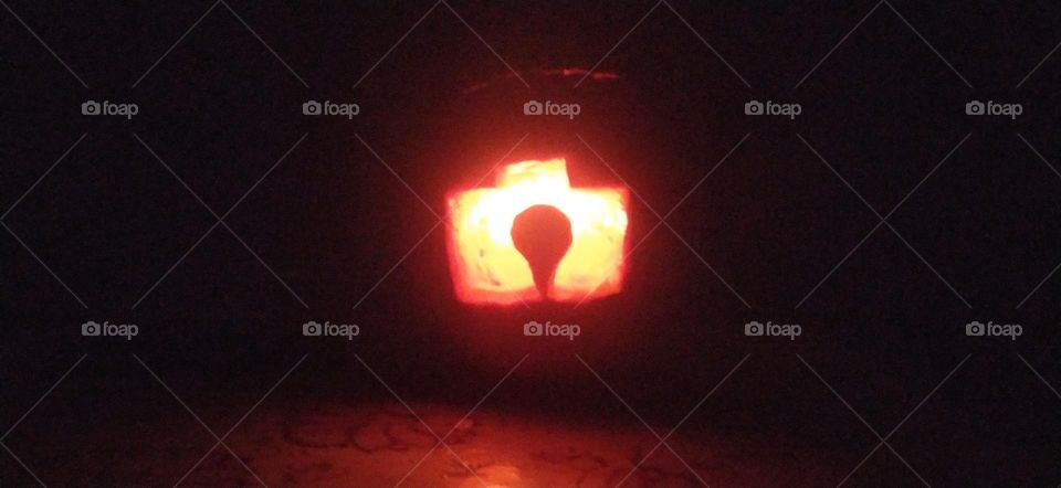 halloween celebrate. foap shining into pumpkin