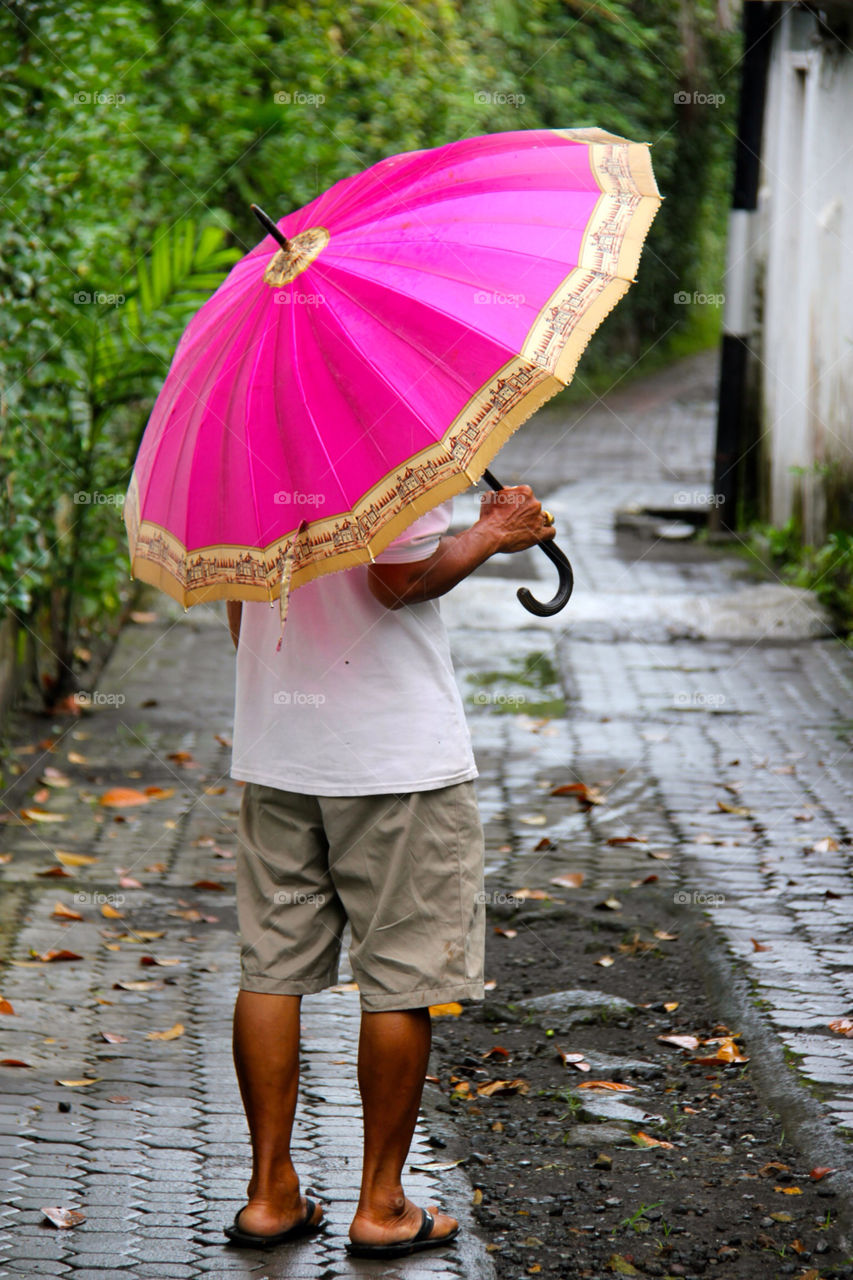pink man streets umbrella by squisheefishee
