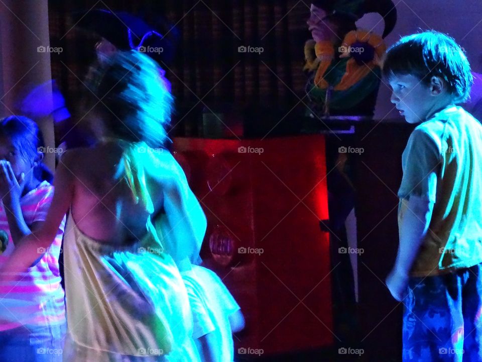 Children Dancing. Young Children Dancing In A Nightclub
