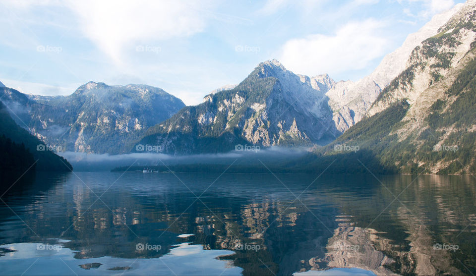 Reflection of mountains on lake Konigssee