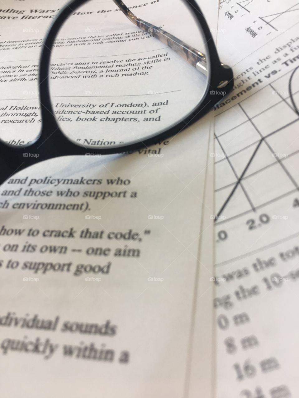 Glasses on some papers 