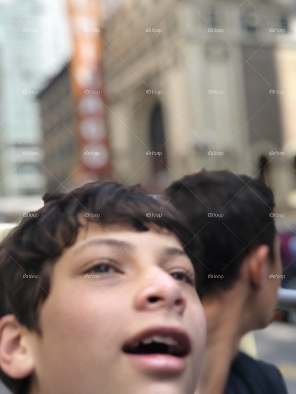 Boy looking up in awe