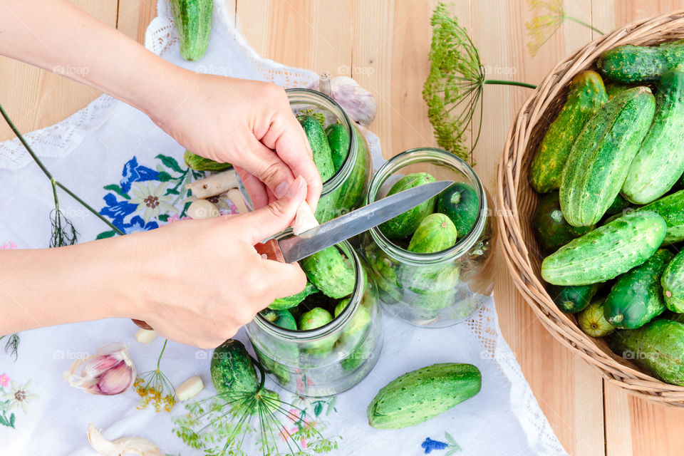 Pickling cucumbers. Pickling cucumbers with home garden vegetables and herbs