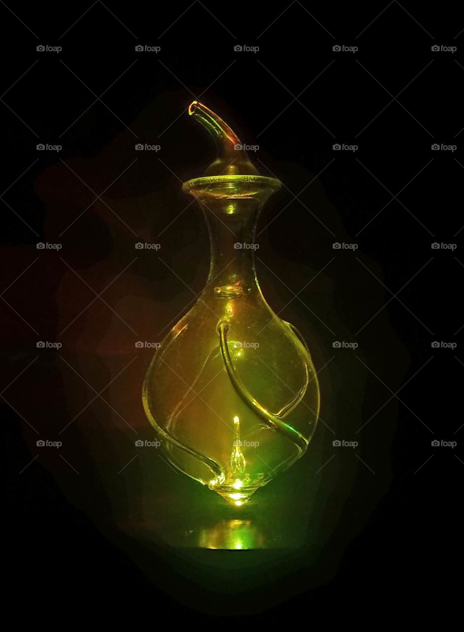 essential oil diffuser, glowing in darkness