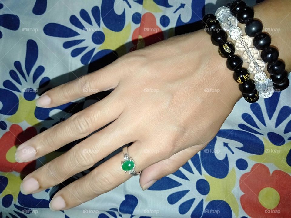 Wearing Authentic Jade stone ring with matching stones bracelet.