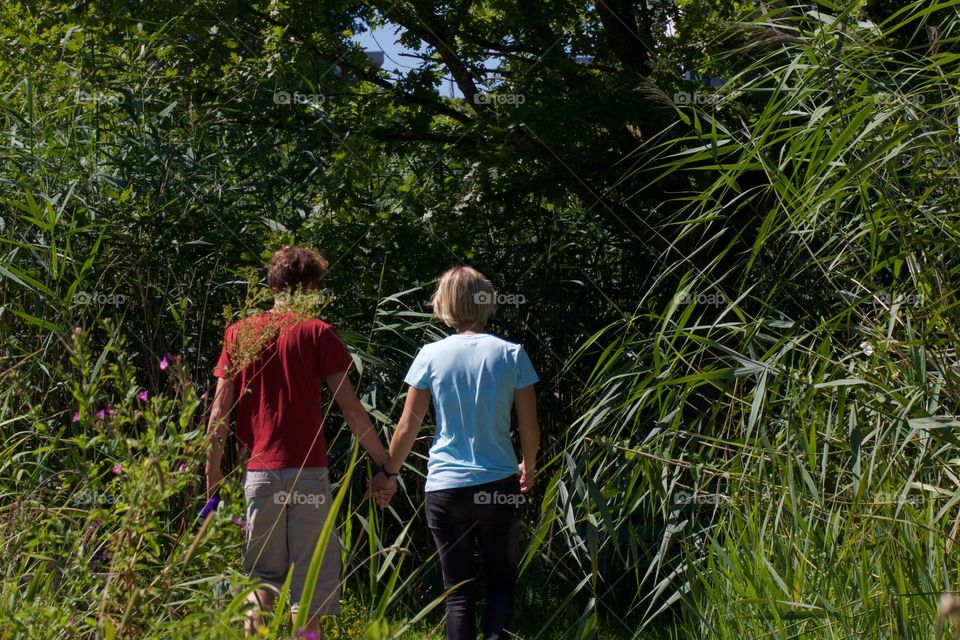 Couple Walking In The Nature