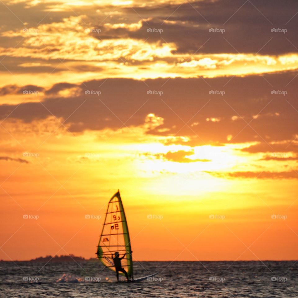 Windsurfing at dusk