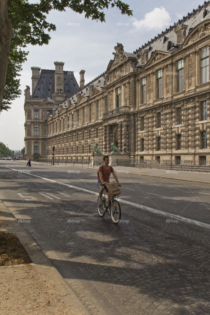 Riding in Paris. Parisian commuting during a sunny day