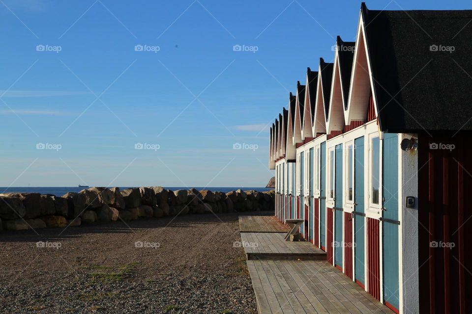 Small wooden houses in a harbor in a small village 