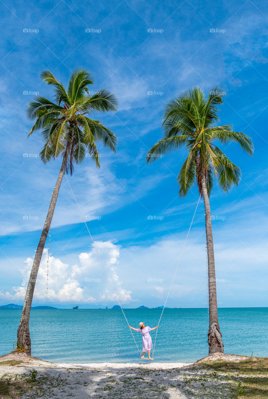 Enjoy trip in summer vacation on beautiful beach