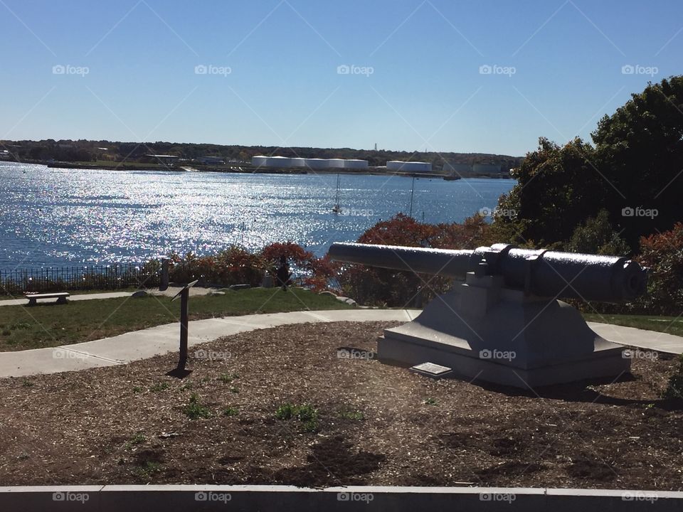 Civil War-era cannons overlook harbor of Portland, Maine at Fort Allen Park. 