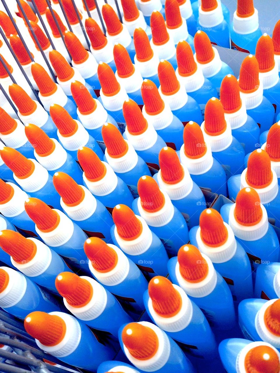 liquid clear and white glue in plastic bottles