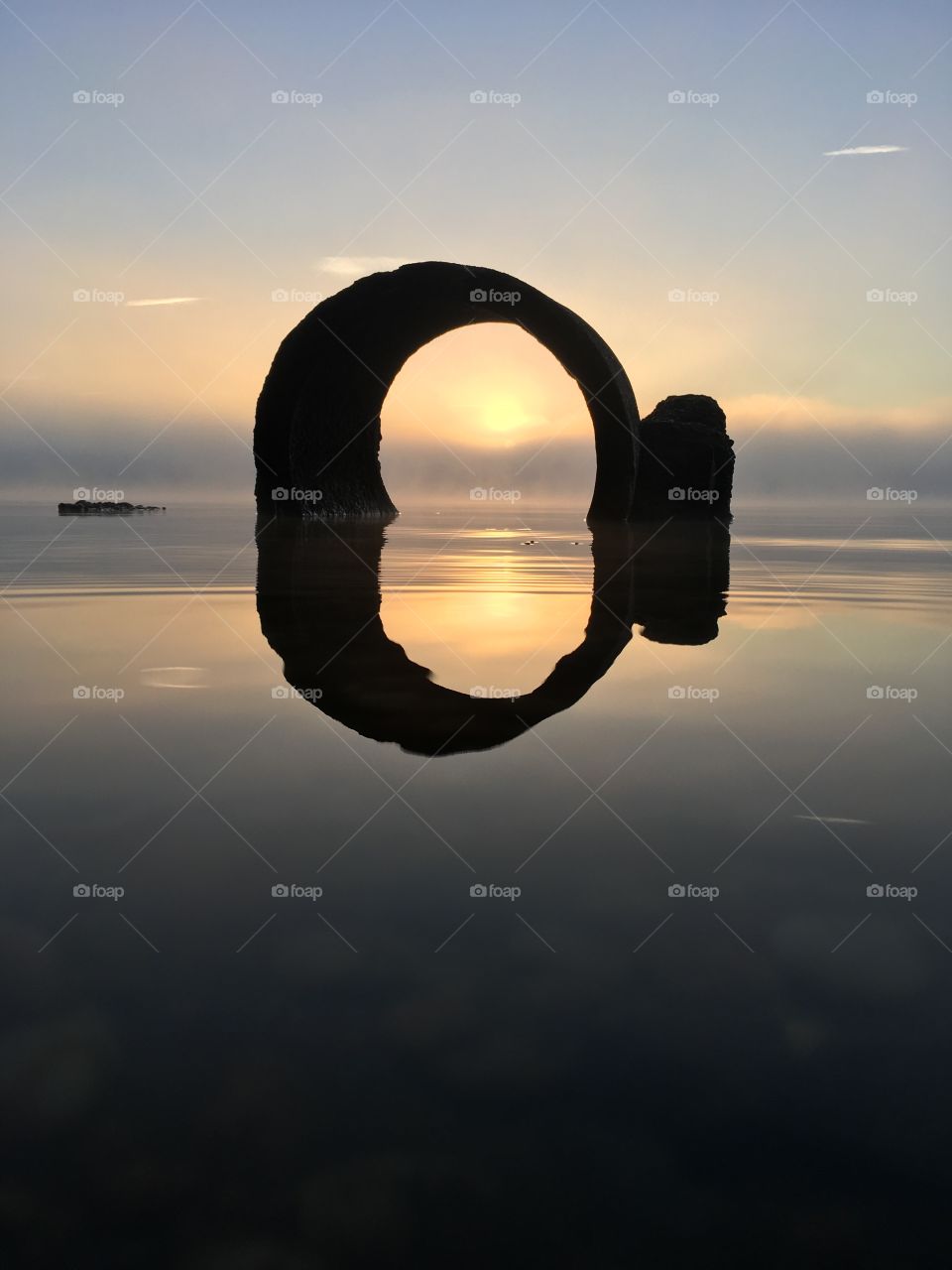 Symmetry of natural arc on sea