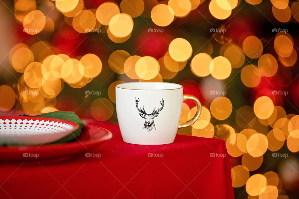 cup of coffee in a cozy festive Christmas atmosphere