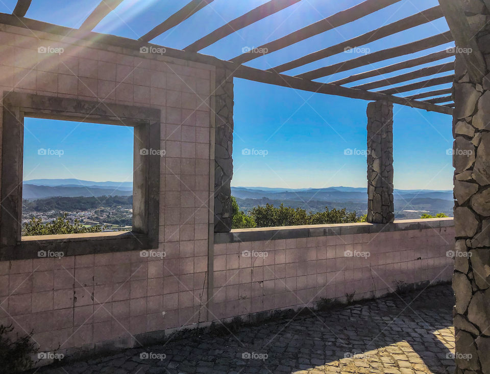 Miradouro da Serra de Alvaiázere - Portugal. A view across Alvaiázere from high above out of the windows of a viewing structure 