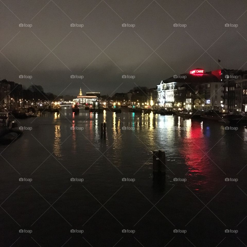 Amstel River by night in Amsterdam
