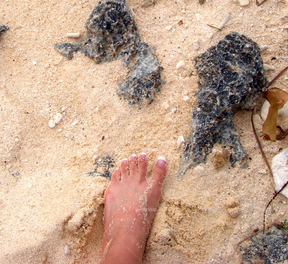 Feet in the sand