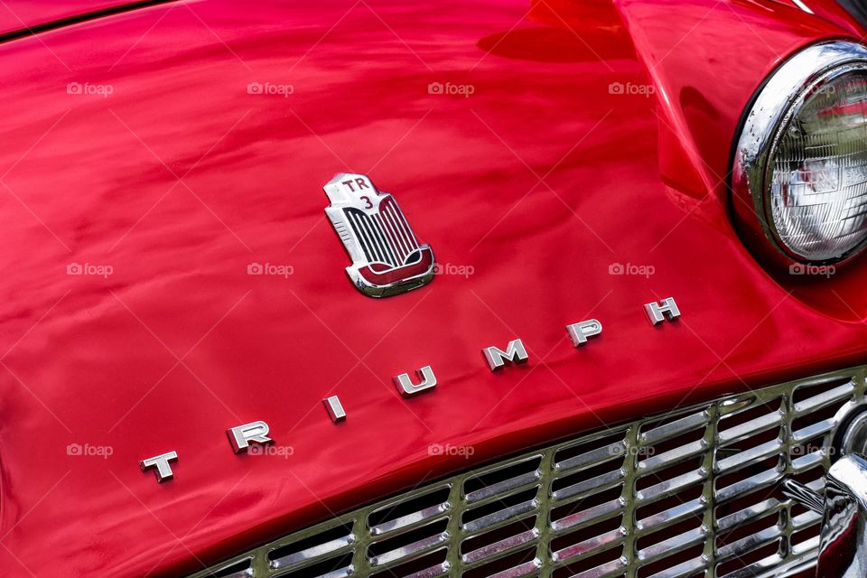 Red hot Triumph TR3 automobile