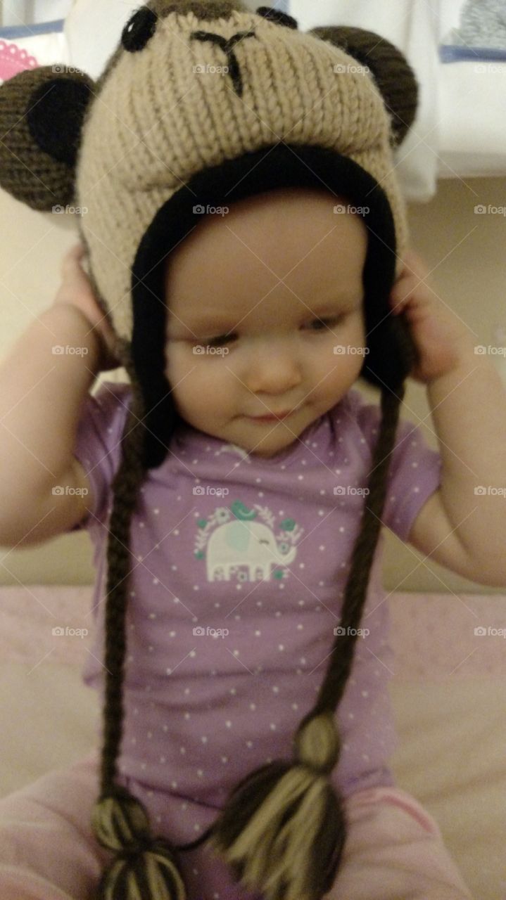 baby girl with monkey hat