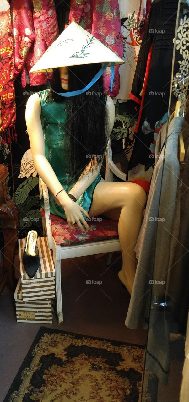 Mannequin in chair