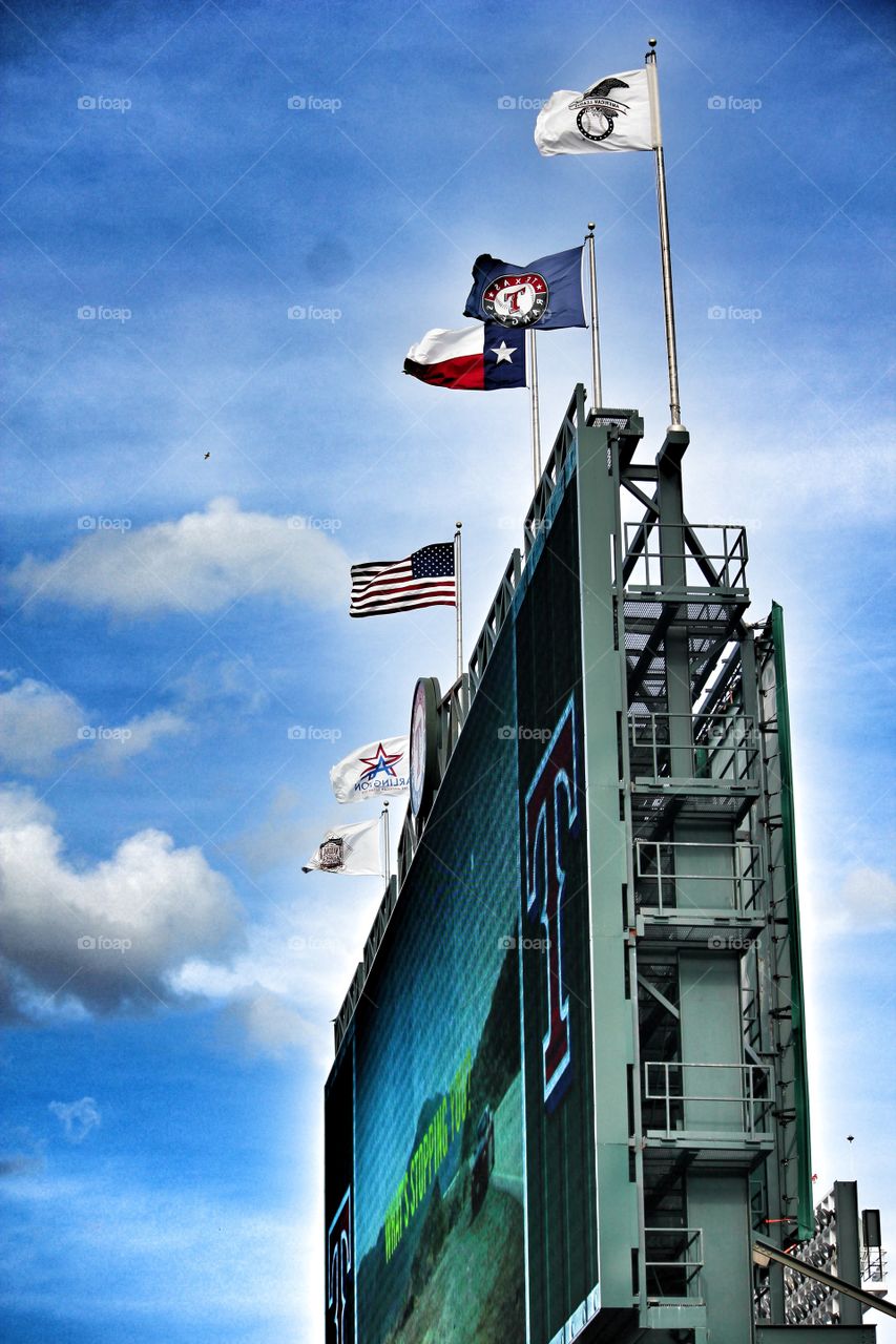 Top of the tron. Flags flying on top of the jumbotron at globe life park in Arlington Texas
