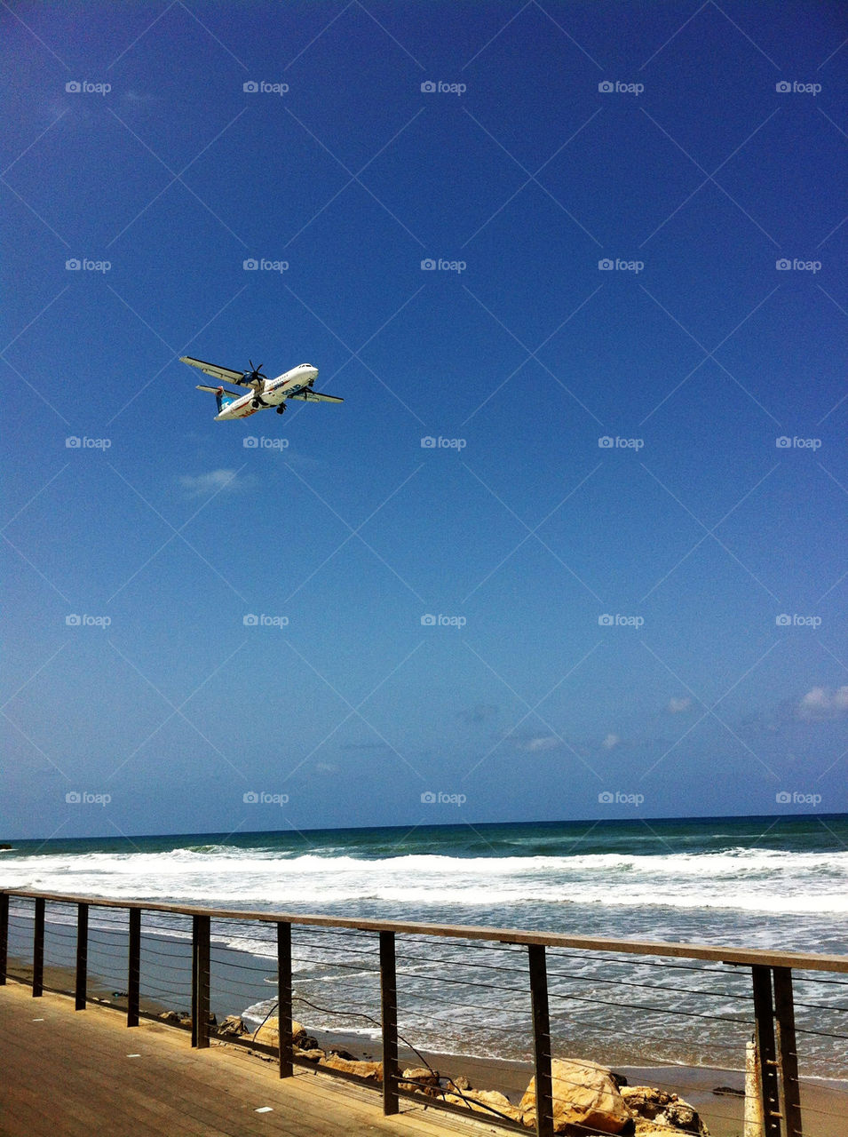 beach sky blue plane by moosh