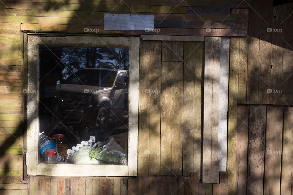 Window with reflection of the car