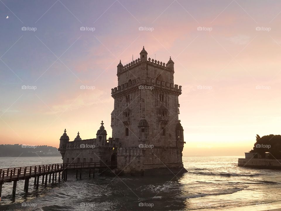 Sunset over the Belem Tower in magical Lisbon, Portugal. 