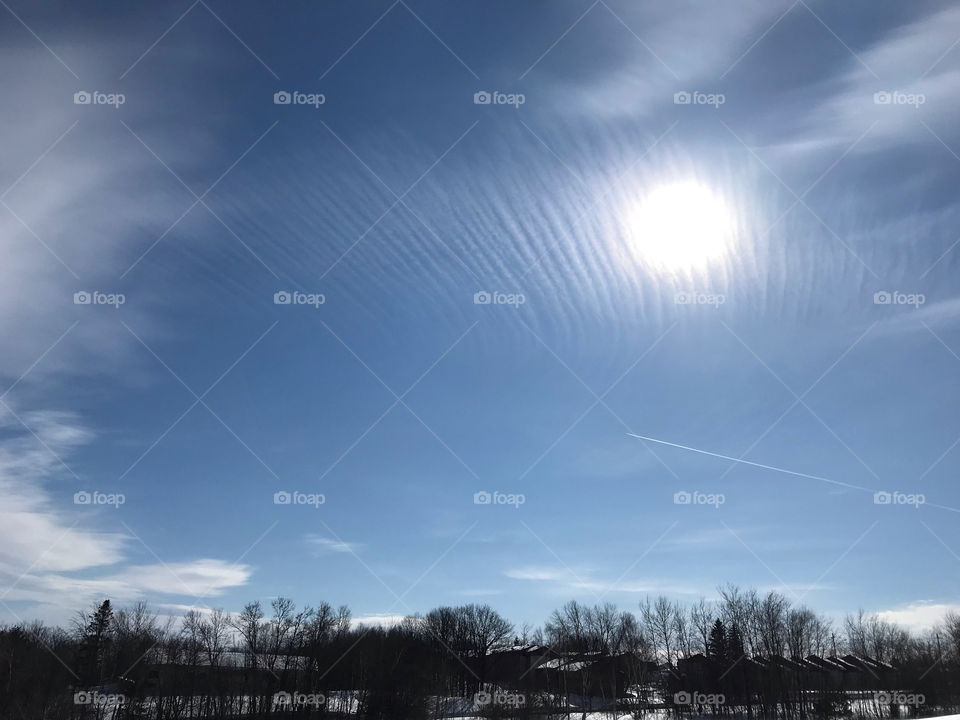 Cool clouds across a sunny sky