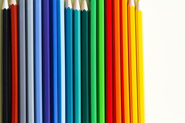Bright, color pencils for drawing in the album. Stationery and goods for study and work.