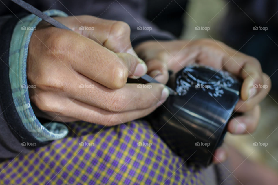 Lacquer bowl in women hand