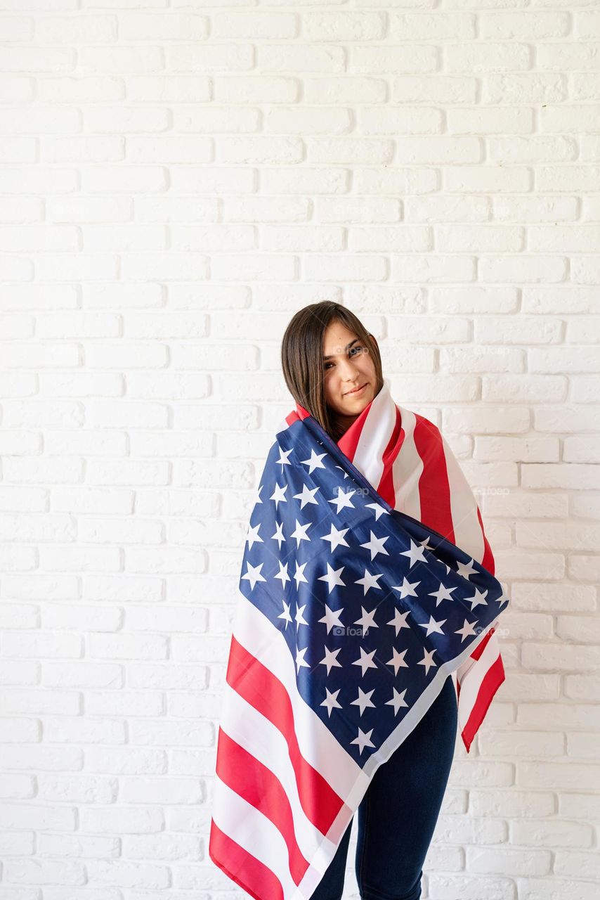 woman holding USA flag