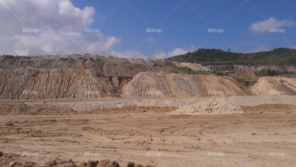 scene of cloudy sky with desert.