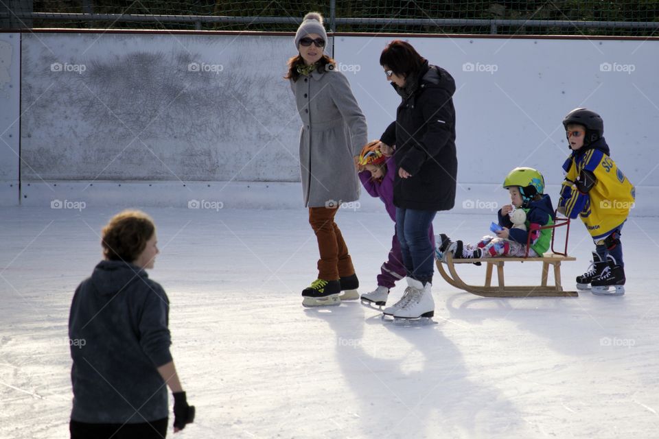 Family on ice rink
