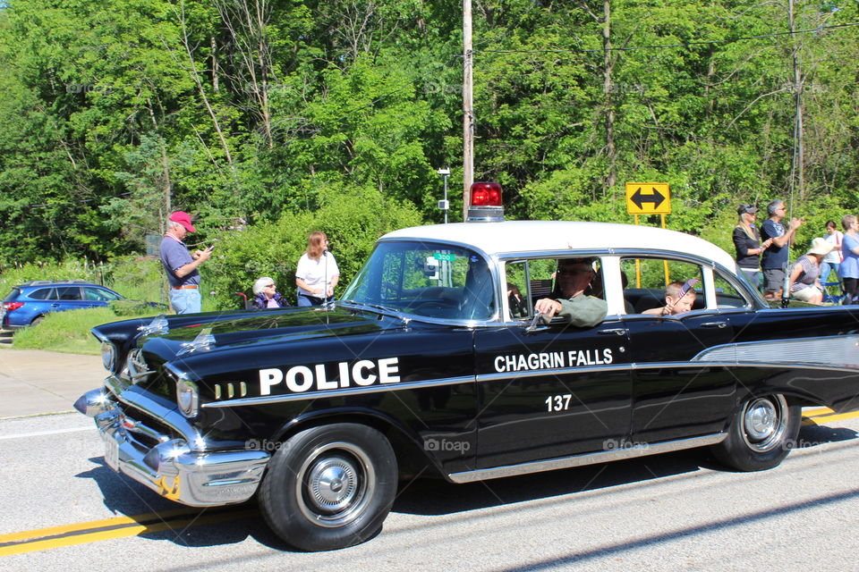 Old vintage police car in parade